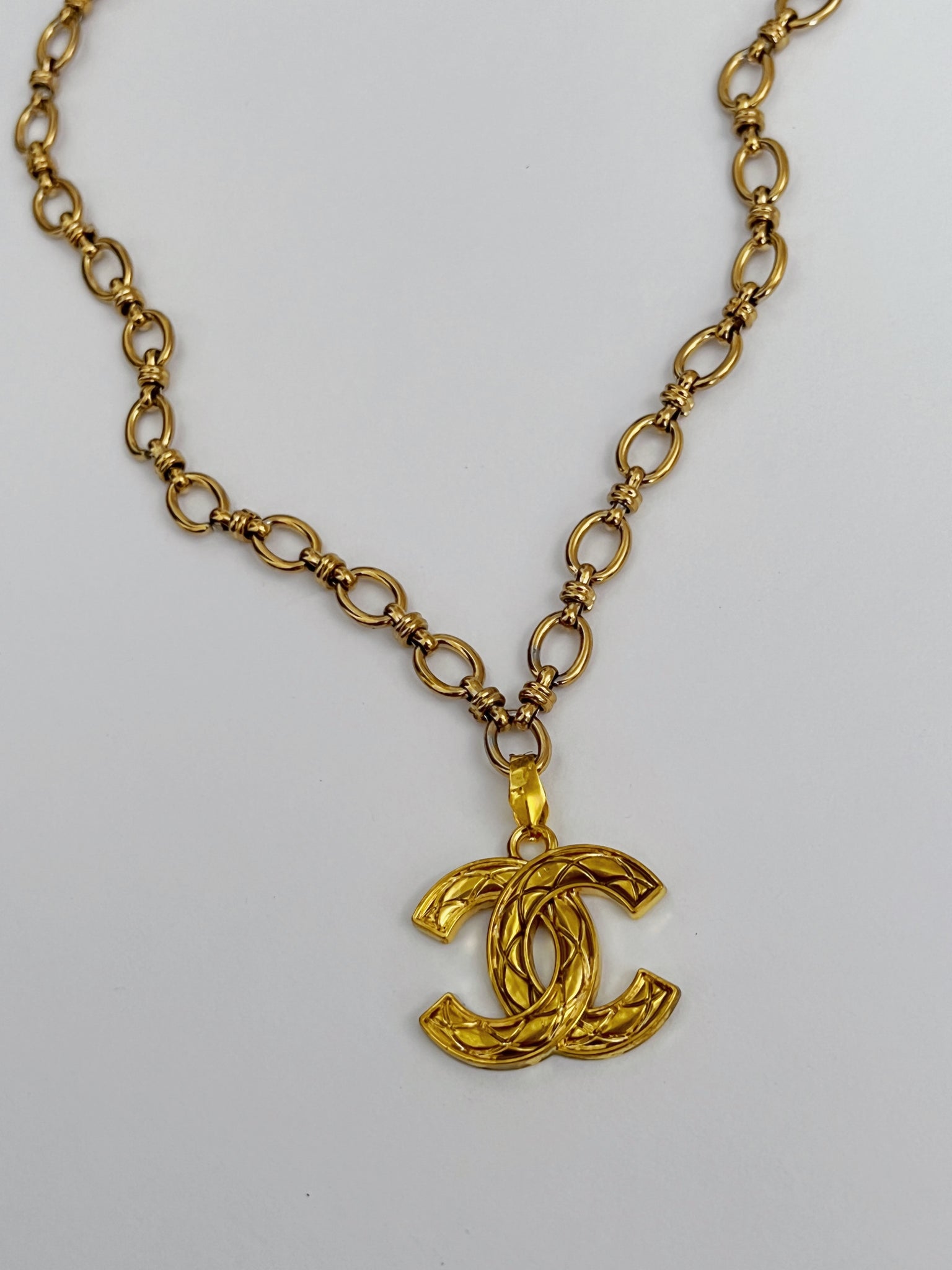 Chanel Charm Vintage Refurbished Designer Pendant Button necklace.